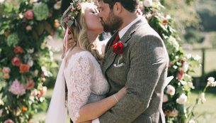 Sam's buttonhole, the floral arch & a beautiful moment